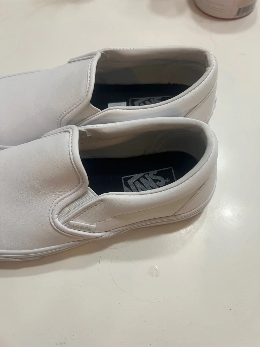 Vans Men’s White Slip-On Loafers